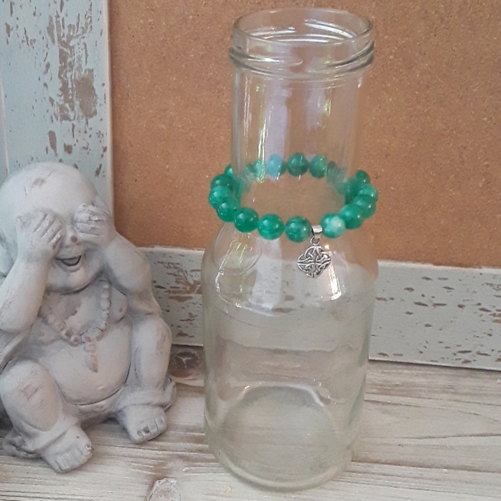 Green Beaded Bracelet with Celtic Charm